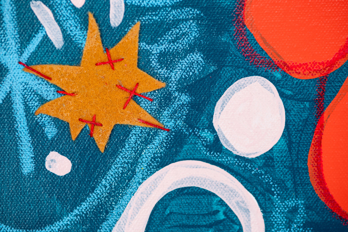 Detail of Untitled (Flowers) by Sydney Noland: an orange star shape with red stitches, white circles, and red petals on teal